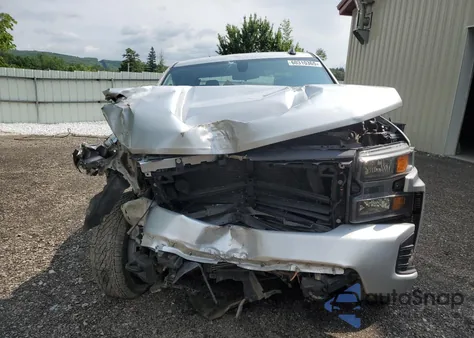 2020 Chevrolet Silverado K1500 Custom from USA, damaged, VIN 1GCRYBEK9LZ208044